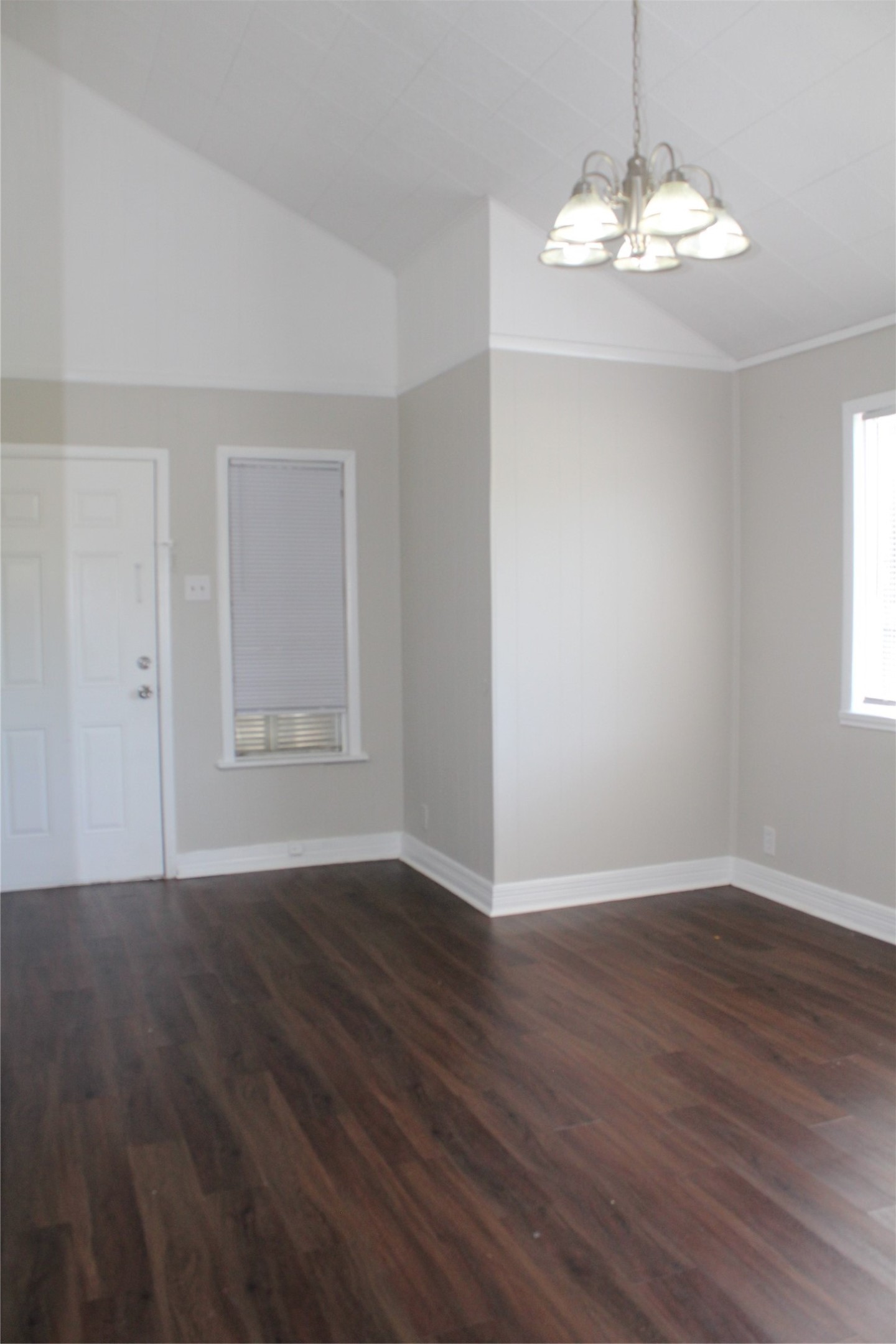 817 Hudler Street La Marque, TX 77568 - Photo 25 of 43 a view of an empty room with wooden floor and a window