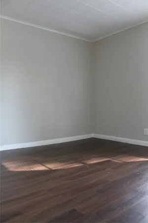 a bathroom with a sink toilet and a mirror