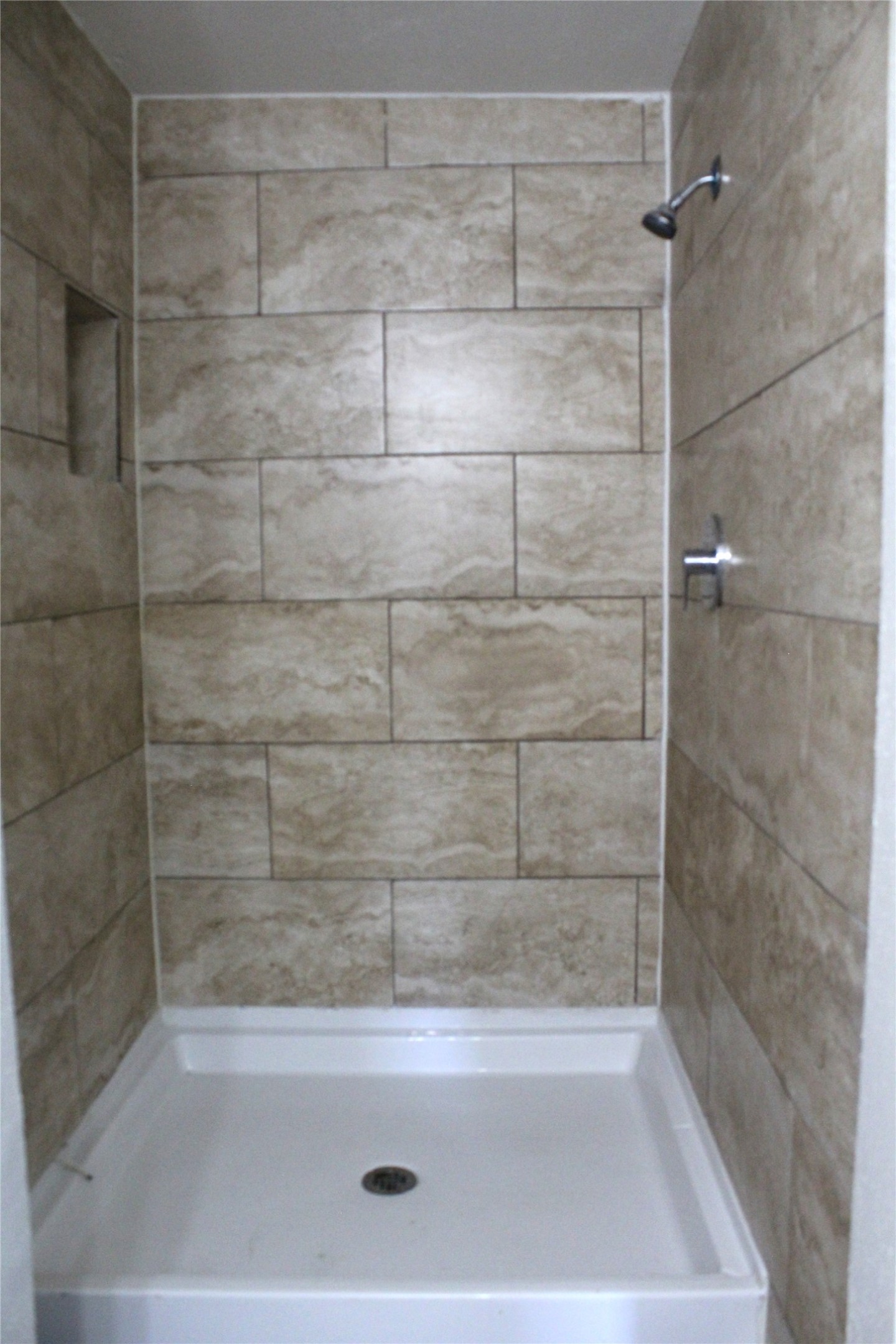 817 Hudler Street La Marque, TX 77568 - Photo 28 of 43 a bathroom with a shower