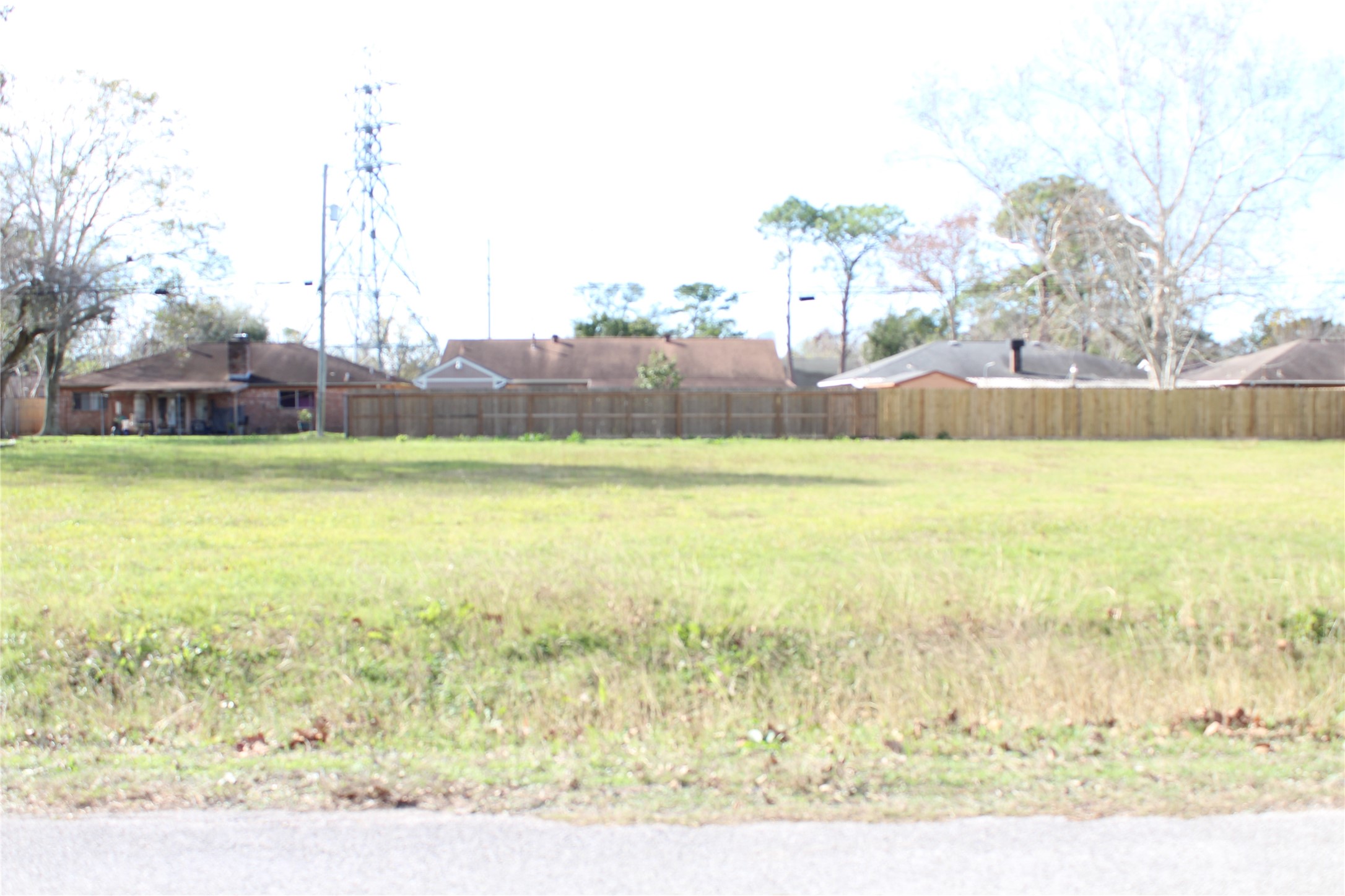 817 Hudler Street La Marque, TX 77568 - Photo 43 of 43 a view of a lake with a big yard