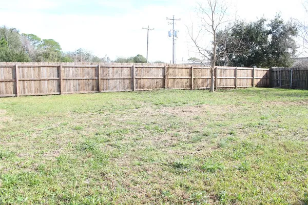 a view of outdoor space with garden and mountain view in back
