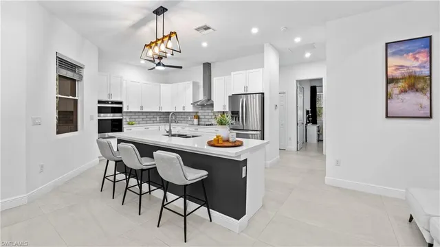 $699,999 | 569 Desoto Boulevard South, Naples, FL 34117