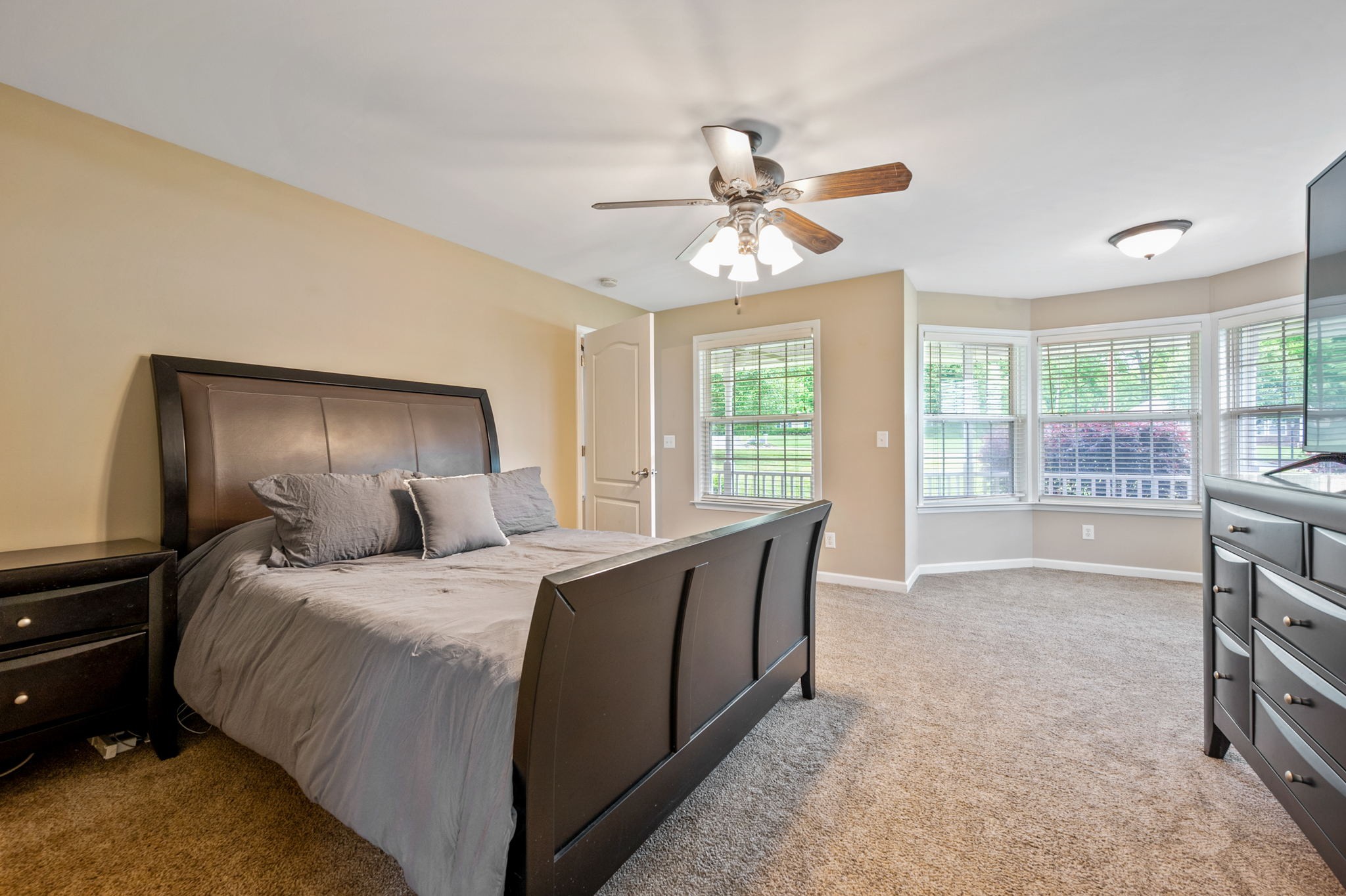 436 Marilyn Circle Spring Hill, TN 37174 - Photo 11 of 25 a bed room with a bed and a chandelier