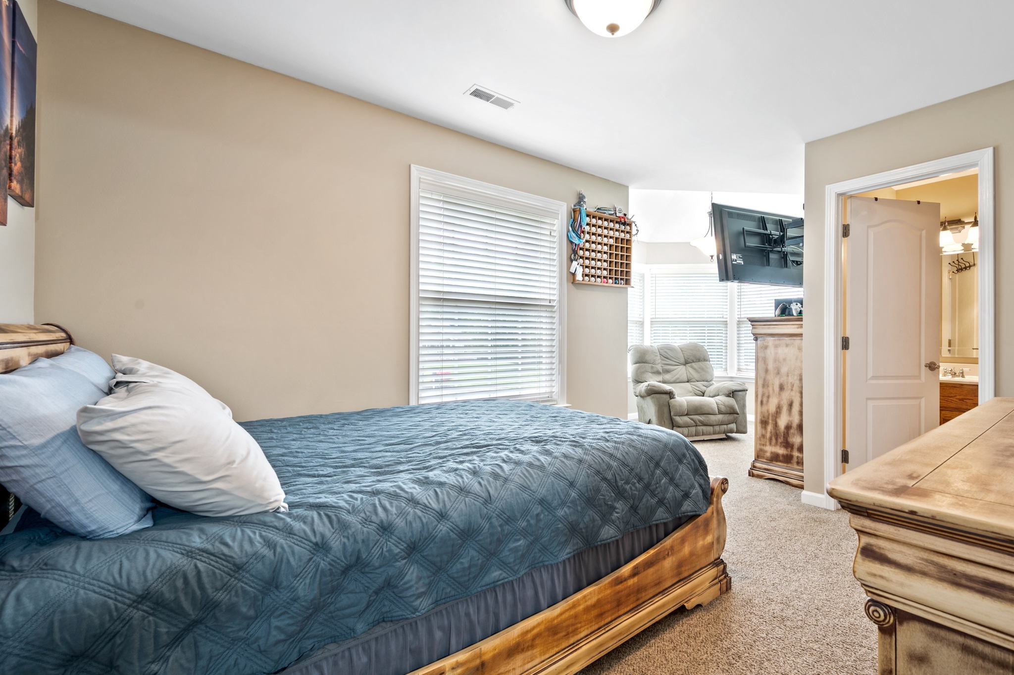 436 Marilyn Circle Spring Hill, TN 37174 - Photo 17 of 25 a bedroom with a bed and wooden floor