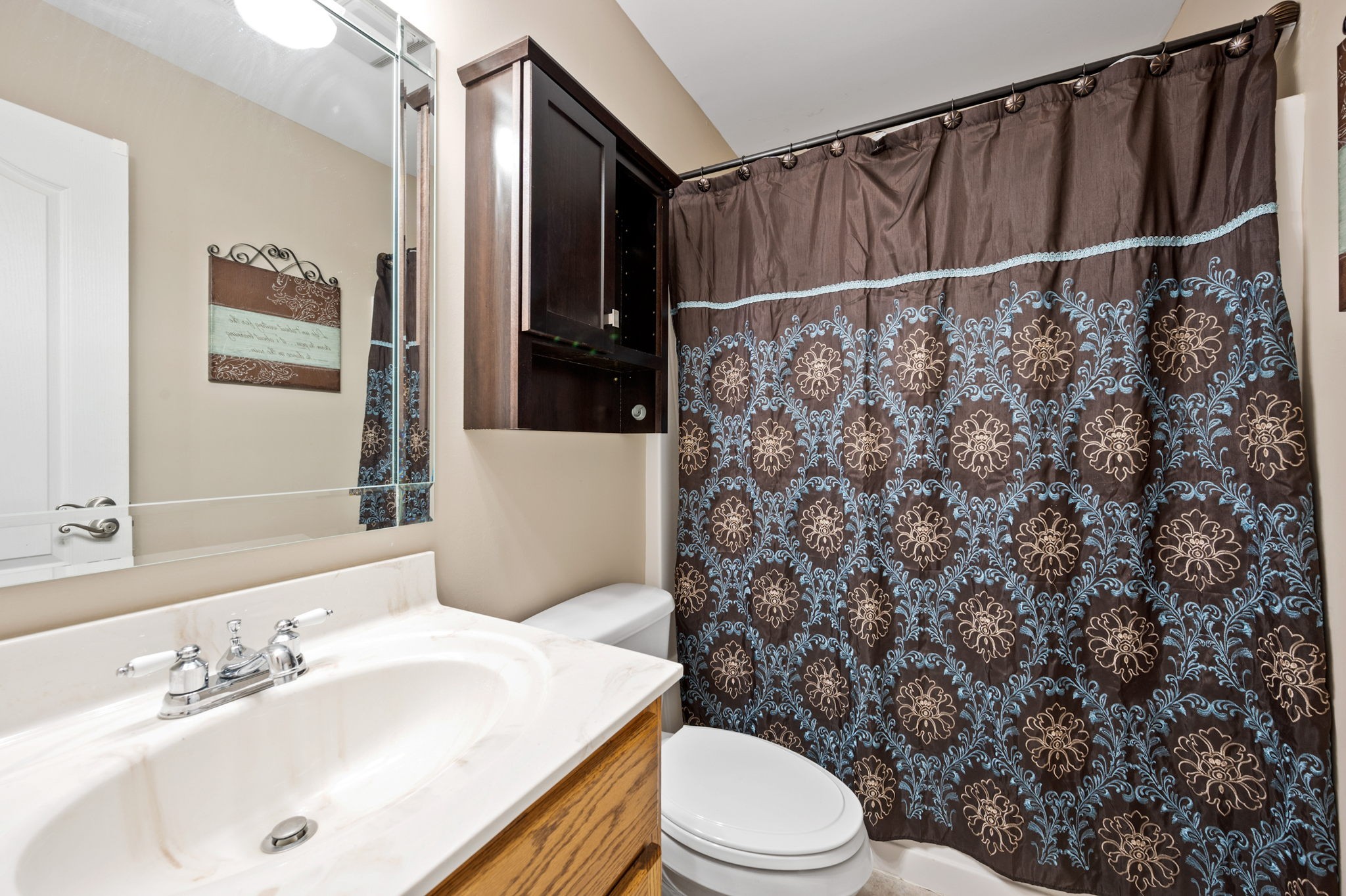 436 Marilyn Circle Spring Hill, TN 37174 - Photo 21 of 25 a bathroom with a sink a toilet and shower