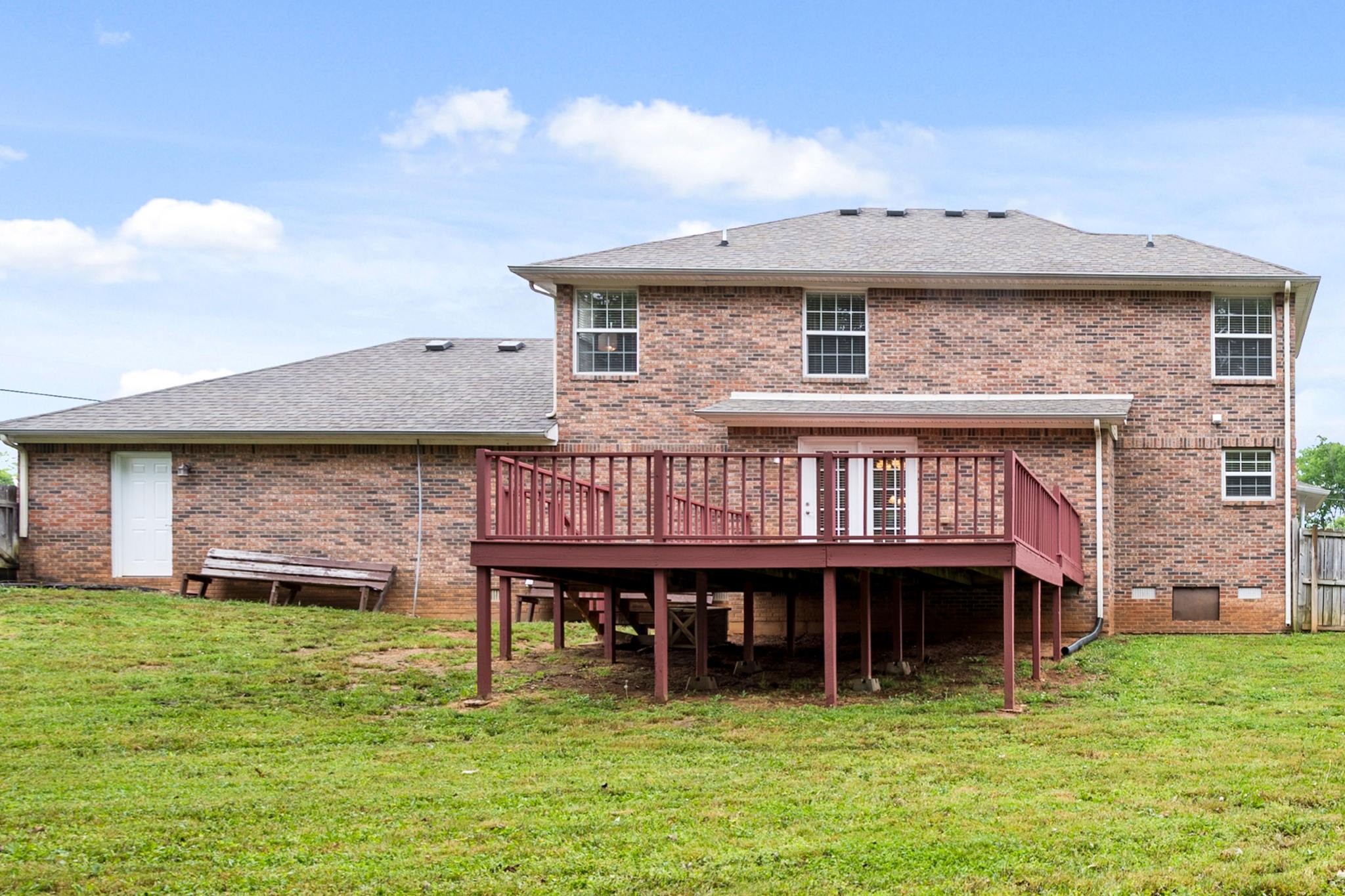 436 Marilyn Circle Spring Hill, TN 37174 - Photo 24 of 25 a view of a house with yard and a deck