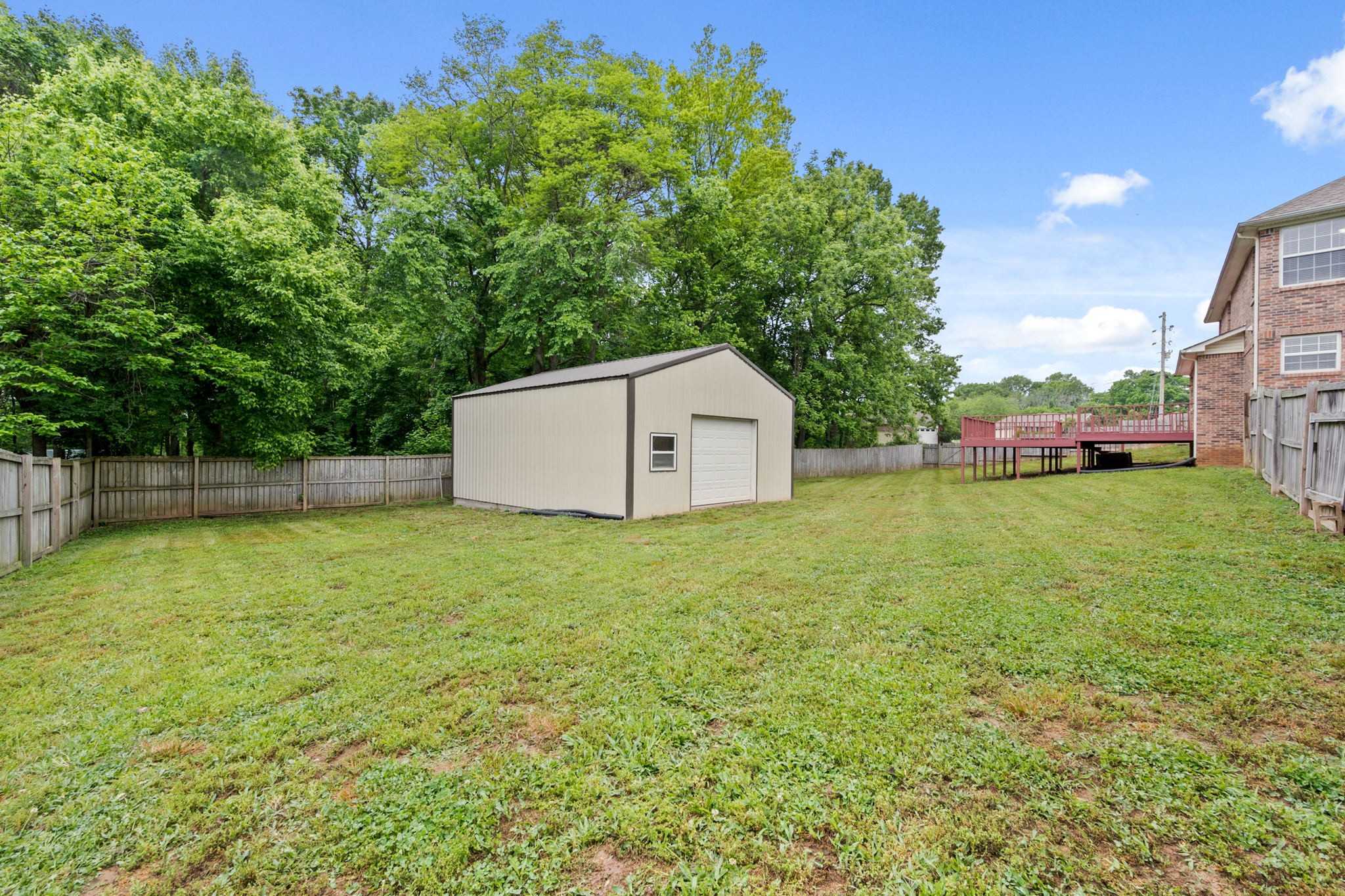 436 Marilyn Circle Spring Hill, TN 37174 - Photo 25 of 25 a backyard of a house with lots of green space