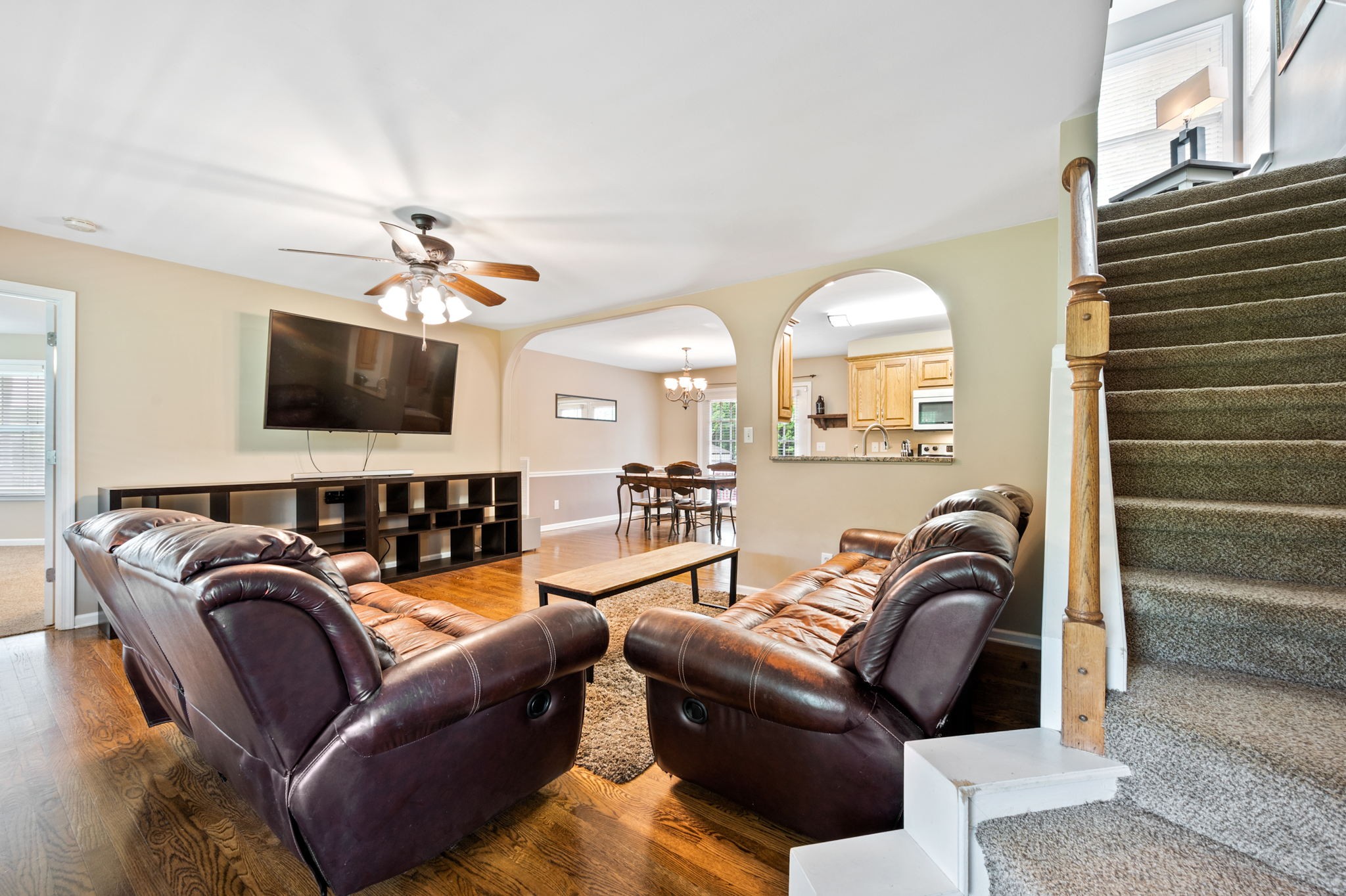 436 Marilyn Circle Spring Hill, TN 37174 - Photo 4 of 25 a view of a livingroom with furniture and a flat screen tv