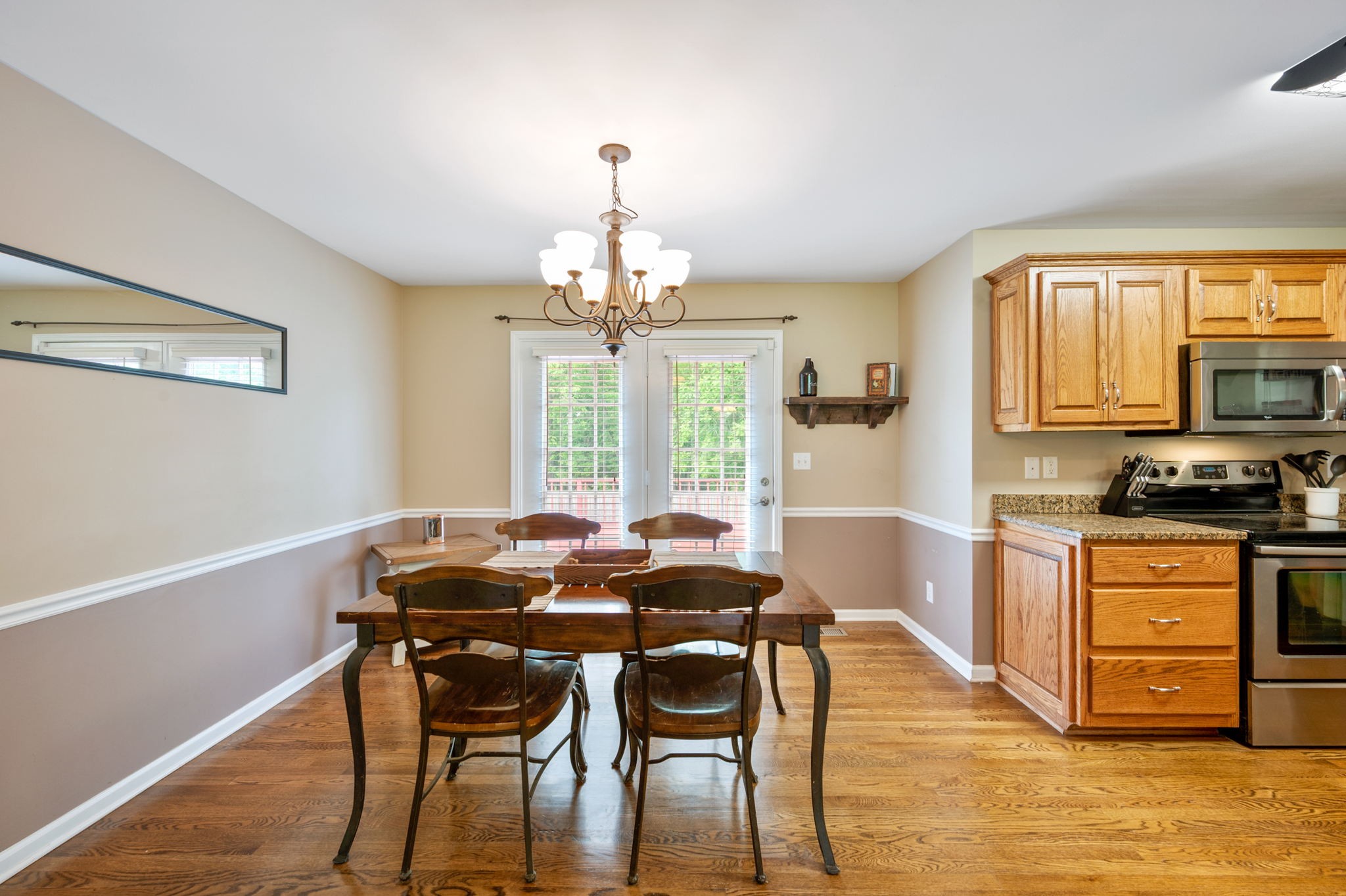 436 Marilyn Circle Spring Hill, TN 37174 - Photo 7 of 25 a view of a dining room with furniture window and wooden floor