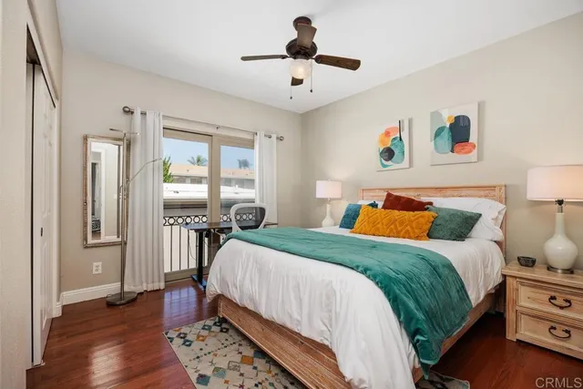 a bed room with a bed and a window