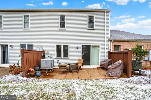 a view of a dinning area in the back of a house