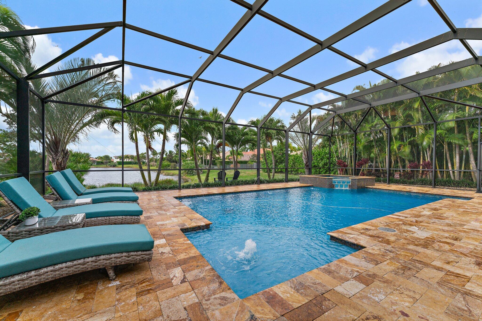 266 Rudder Cay Way Jupiter, FL 33458 - Photo 1 of 79 a view of swimming pool with a patio