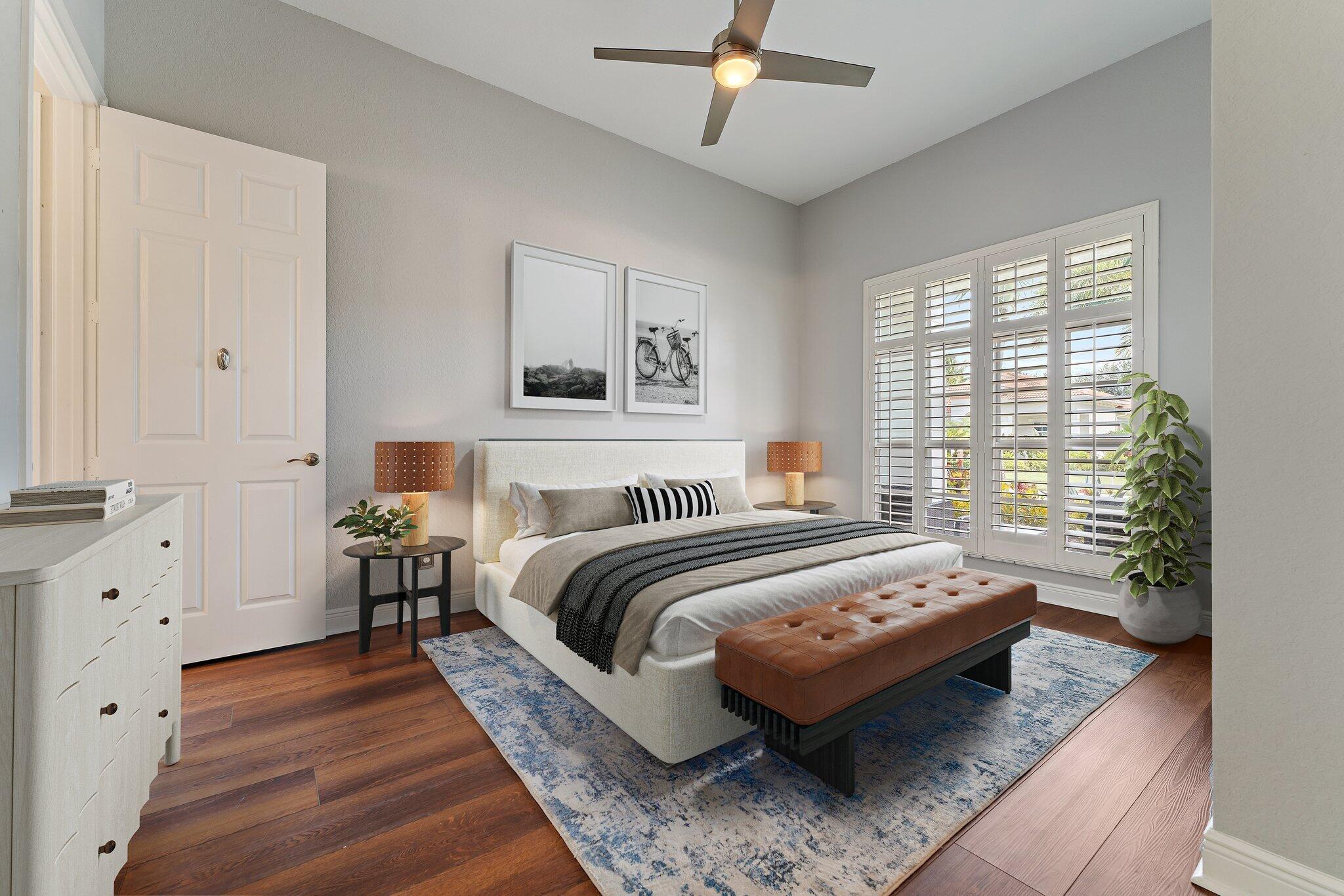 266 Rudder Cay Way Jupiter, FL 33458 - Photo 47 of 79 a bed room with a bed and a couch
