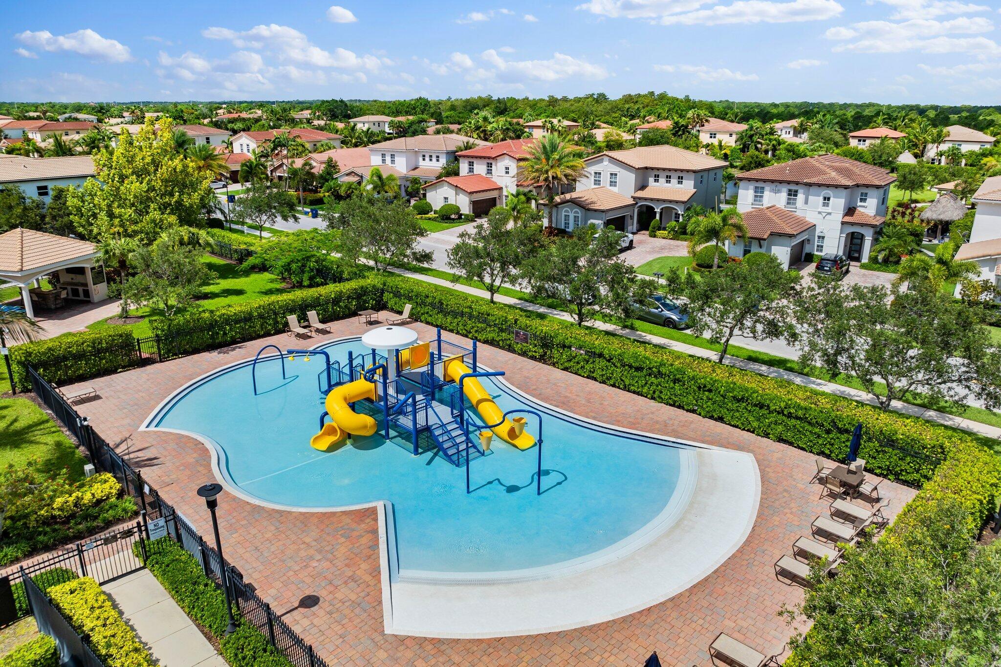 266 Rudder Cay Way Jupiter, FL 33458 - Photo 76 of 79 an aerial view of a house with a swimming pool yard and outdoor seating
