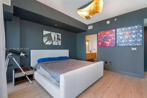 a bedroom with a bed and furniture