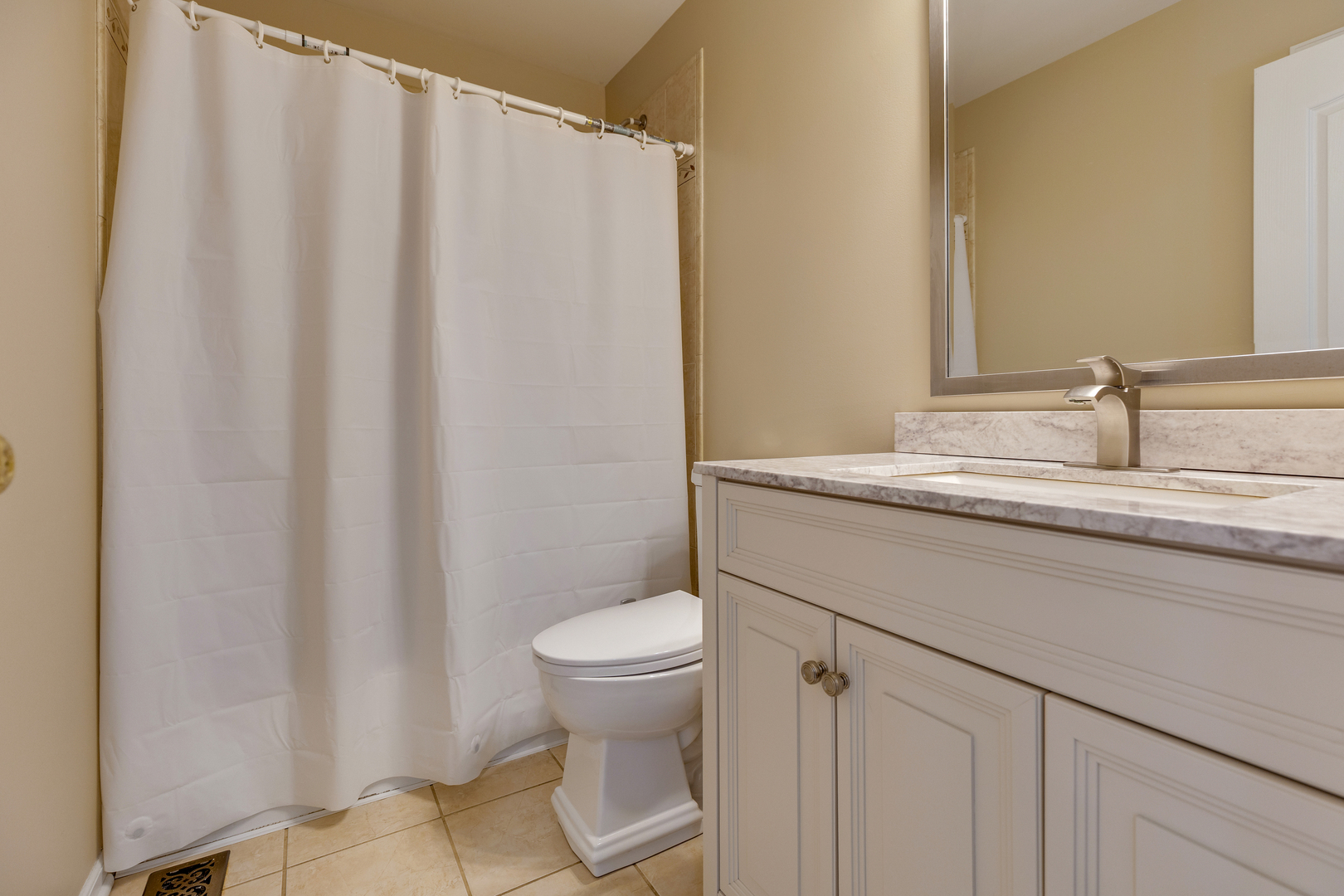 2575 Adamsway Drive Aurora, IL 60502 - Photo 17 of 30 a bathroom with a sink and a toilet