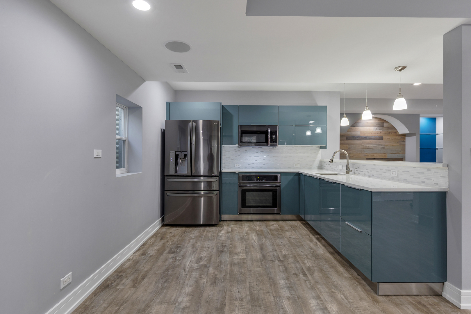 2575 Adamsway Drive Aurora, IL 60502 - Photo 23 of 30 a large kitchen with a refrigerator and a sink