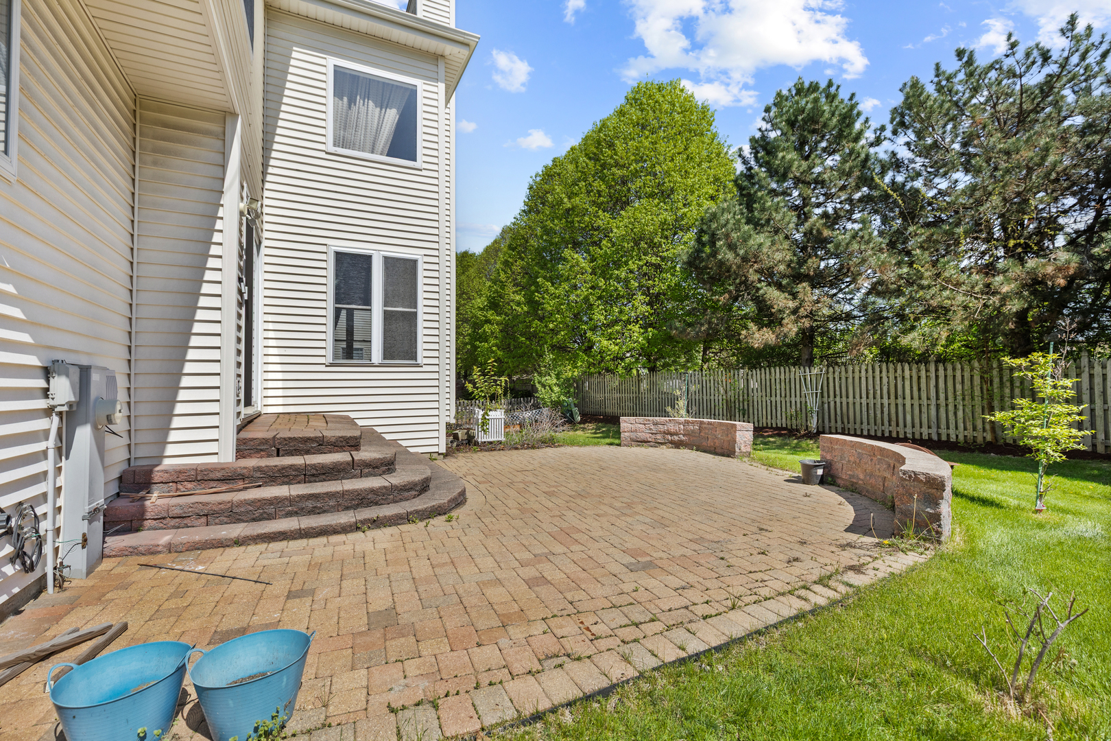 2575 Adamsway Drive Aurora, IL 60502 - Photo 25 of 30 a backyard of a house with seating space
