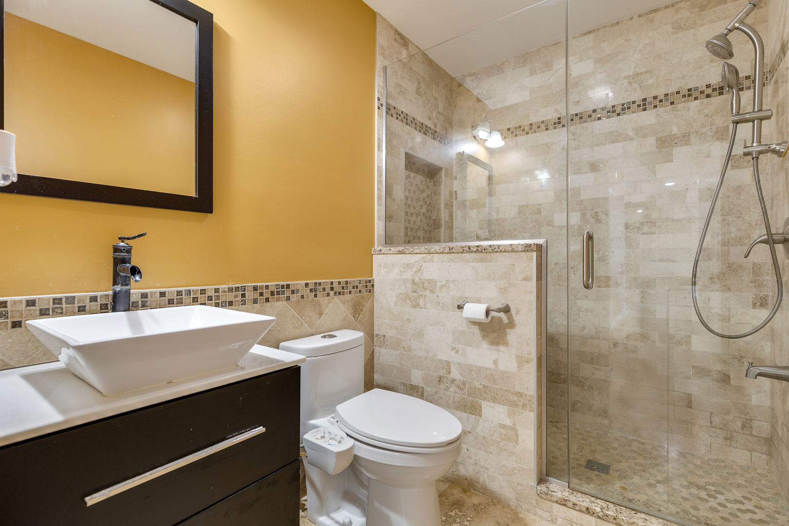 2575 Adamsway Drive Aurora, IL 60502 - Photo 10 of 30 a bathroom with a sink a toilet and shower