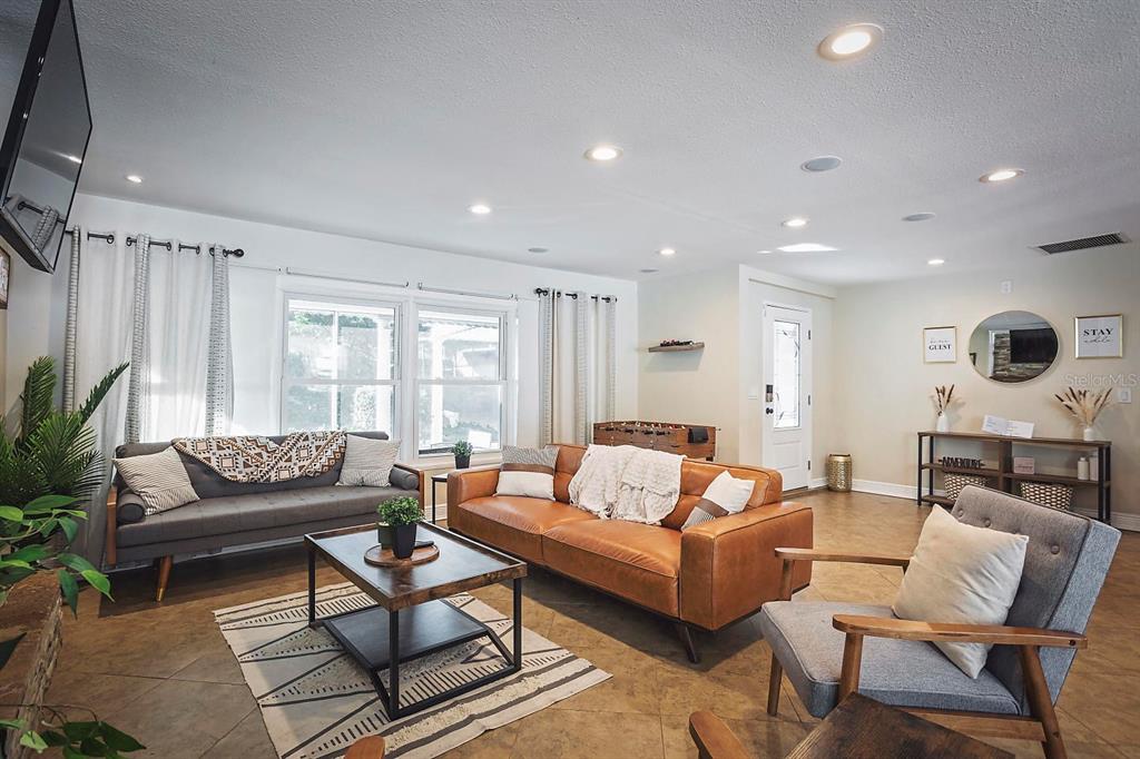 2614 Fairview Avenue Seffner, FL 33584 - Photo 16 of 32 a living room with furniture and a large window