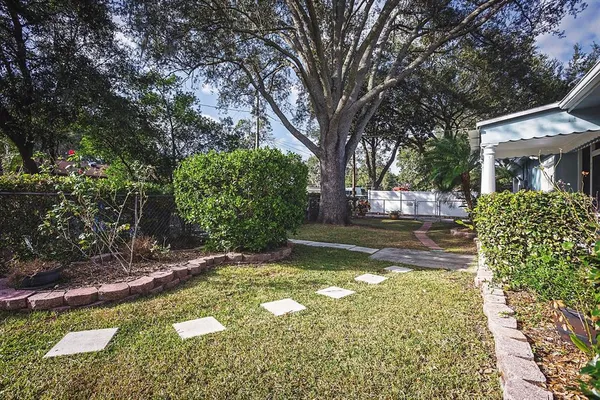 a view of a backyard with a garden