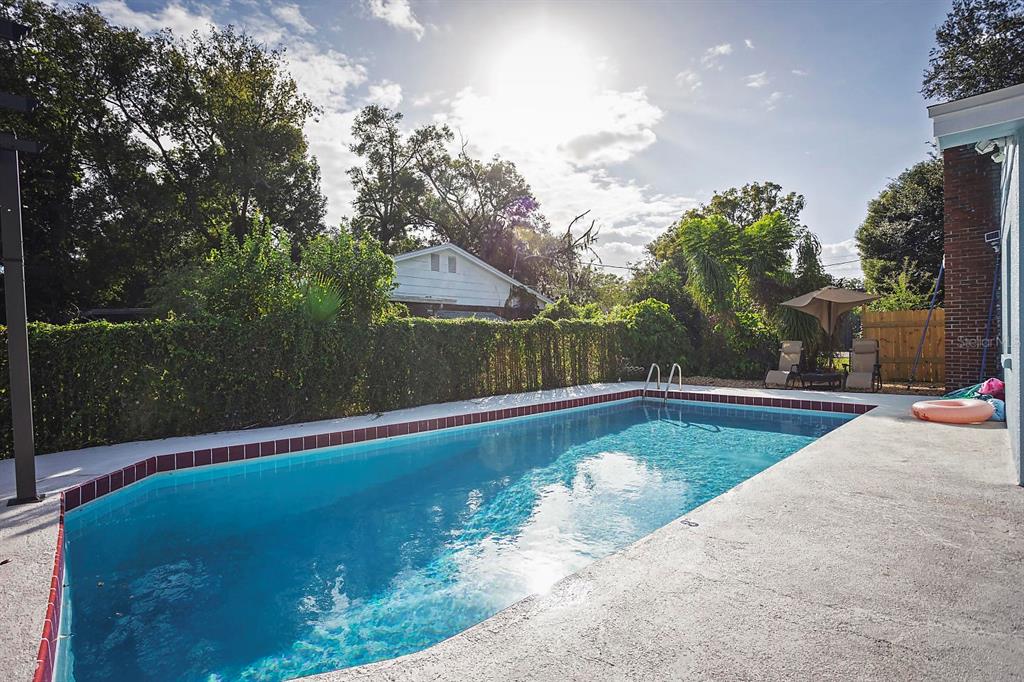 2614 Fairview Avenue Seffner, FL 33584 - Photo 6 of 32 a view of a swimming pool with a yard