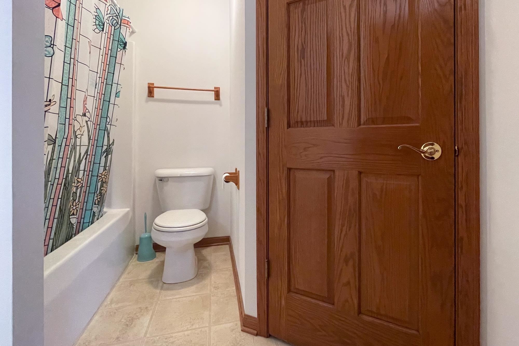 1913 Paddock Court Belvidere, IL 61008 - Photo 11 of 17 a bathroom with a toilet and a shower