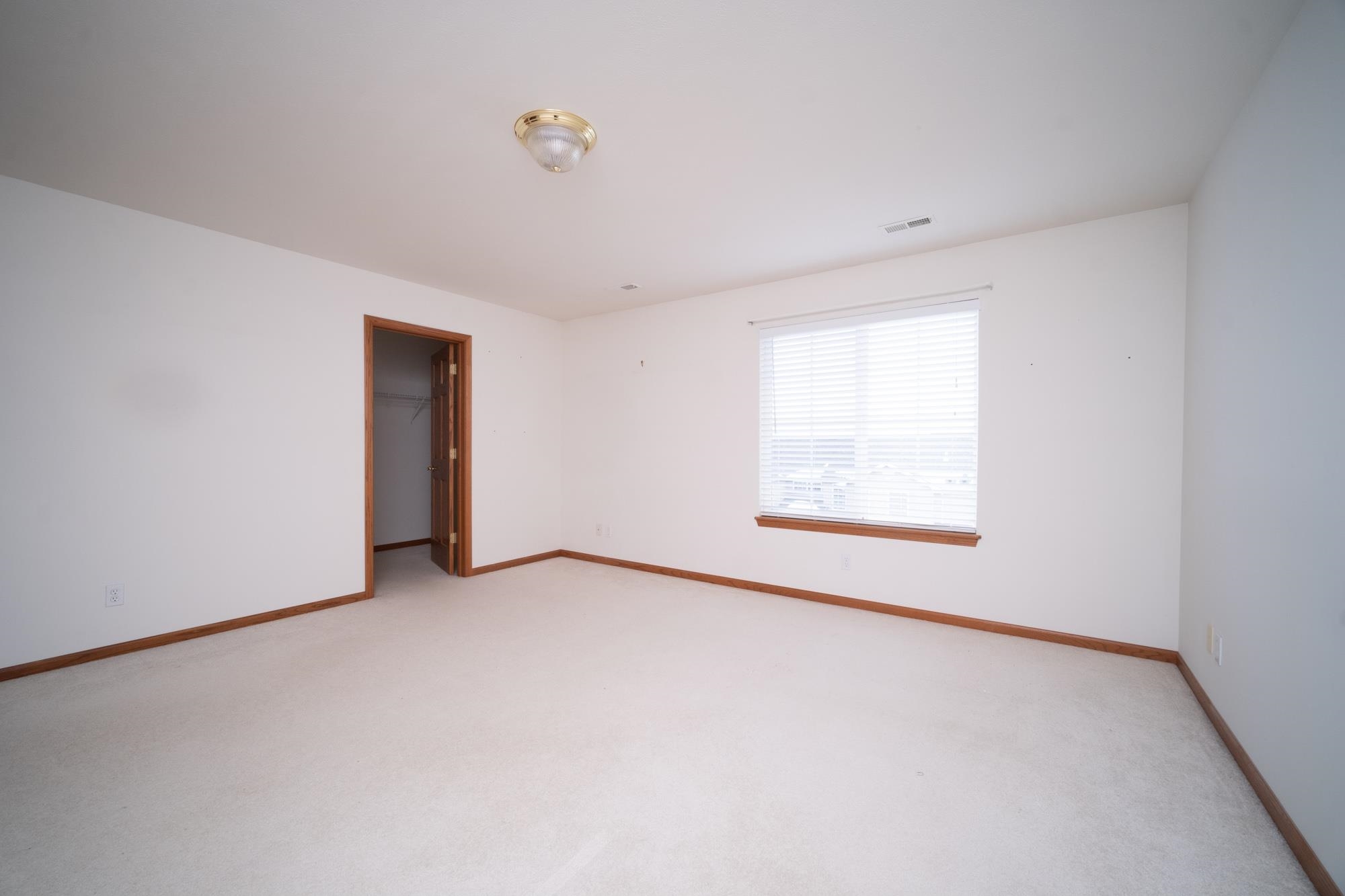 1913 Paddock Court Belvidere, IL 61008 - Photo 9 of 17 an empty room with a window