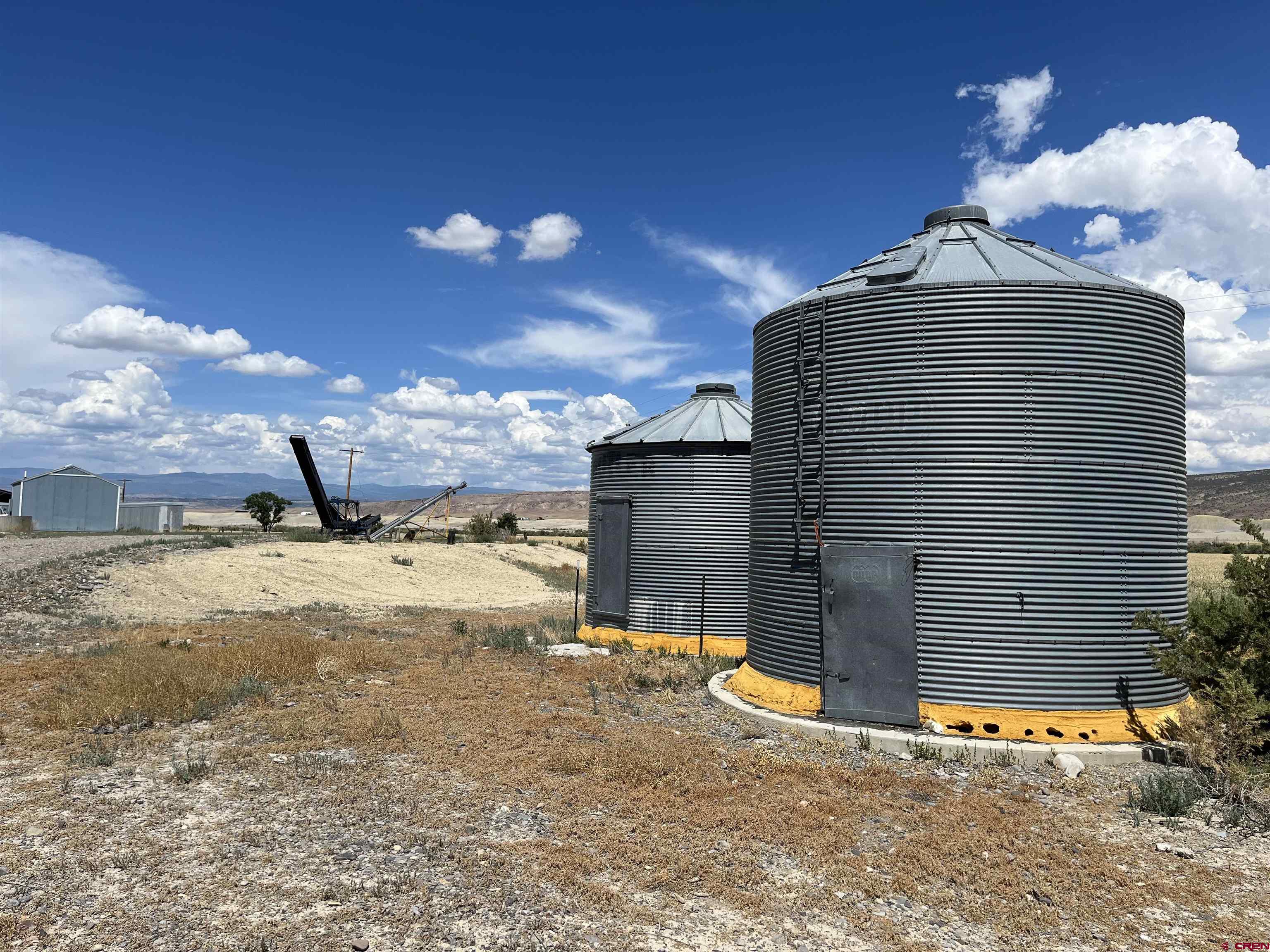 23223 D50 Road Delta, CO 81416 - Photo 12 of 14 a view of a backyard of the house