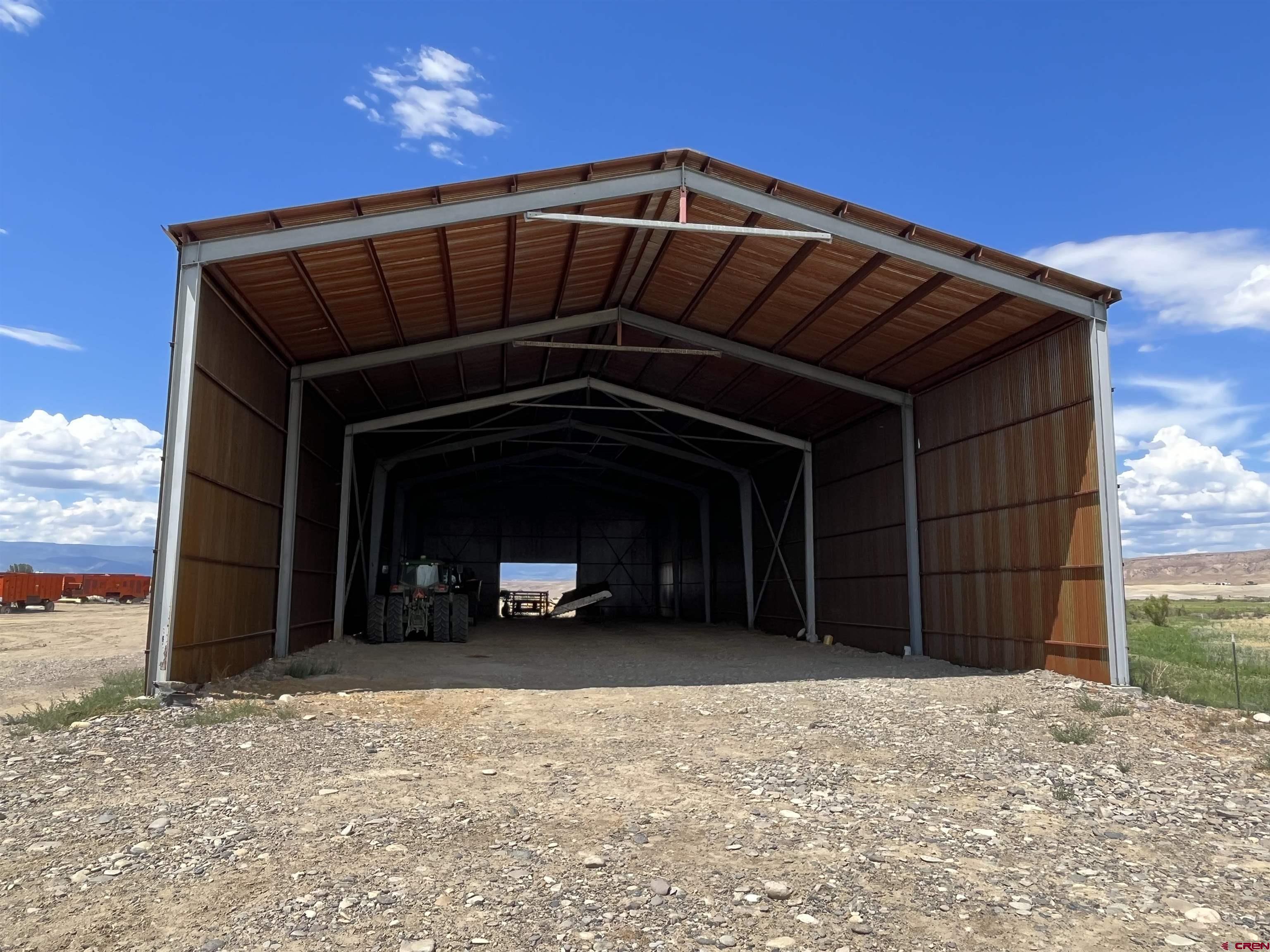 23223 D50 Road Delta, CO 81416 - Photo 13 of 14 a view of a house with a garage