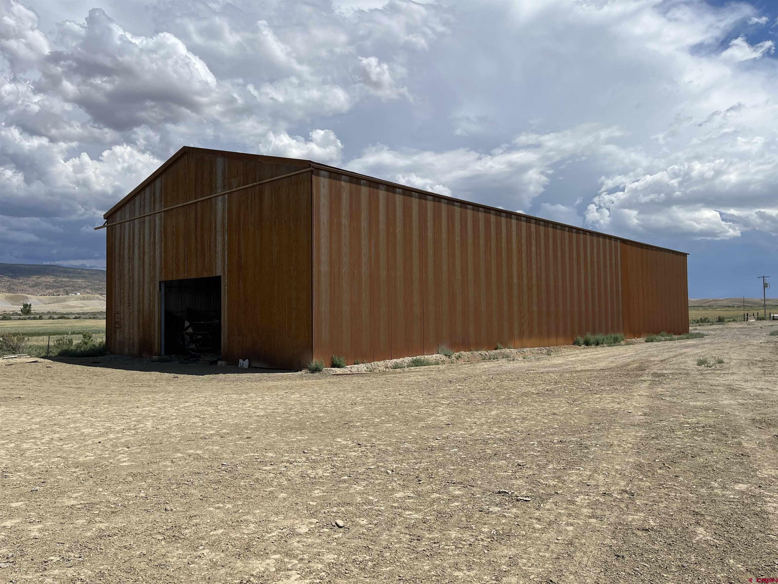 23223 D50 Road Delta, CO 81416 - Photo 4 of 14 a backyard of house