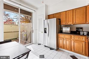 2 Hamlet Hill Road Baltimore, MD 21210 - Photo 7 of 20 a kitchen with stainless steel appliances a refrigerator sink and cabinets