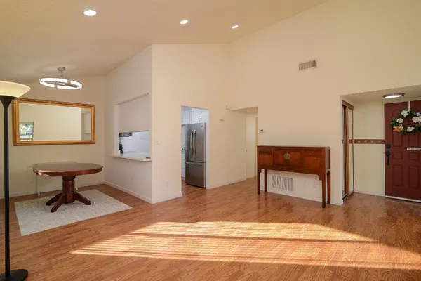 a room with furniture and a window