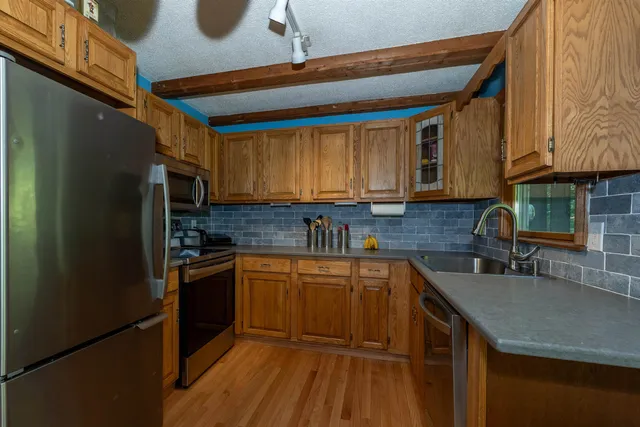 $385,000 | 4 B Pine Isle Drive, Unit B, Derry, NH 03038