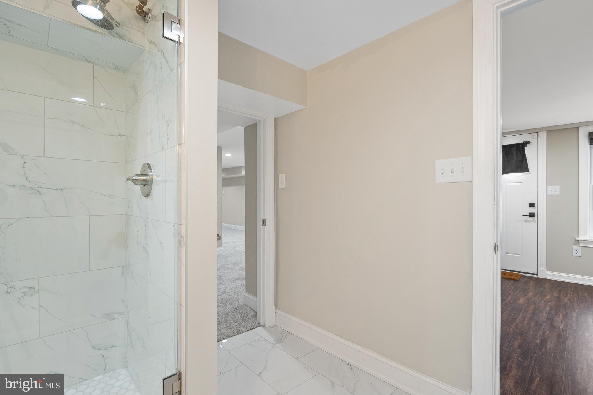 9217 Fowler Lane Lanham, MD 20706 - Photo 63 of 80 a view of a bathroom from a hallway
