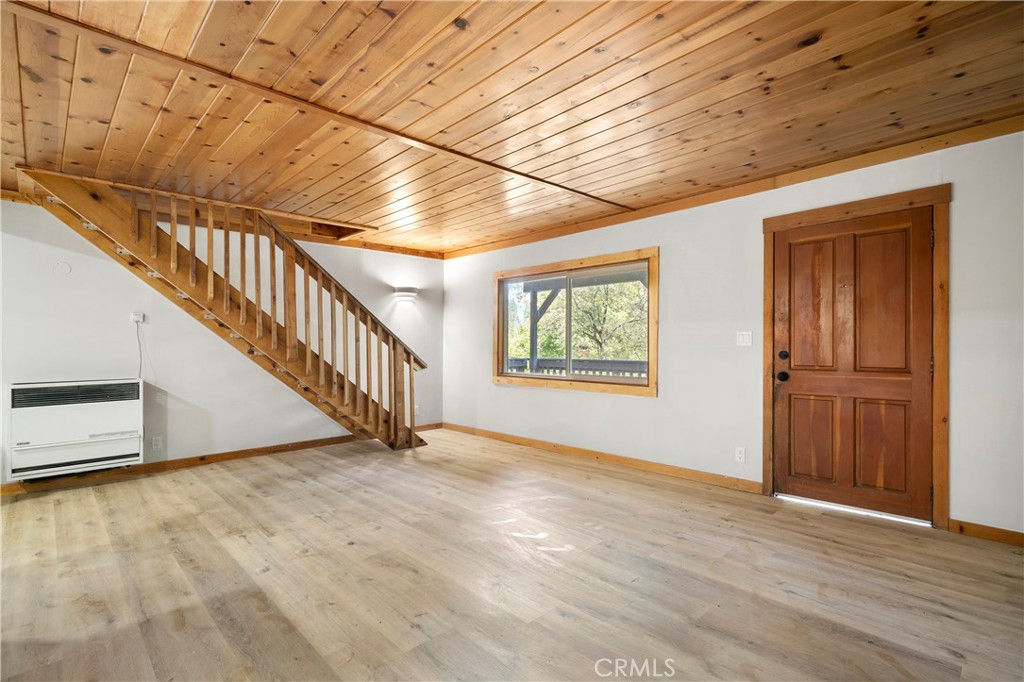 814 Glen View Lane Twin Peaks, CA 92391 - Photo 12 of 38 a view of an entryway with wooden floor
