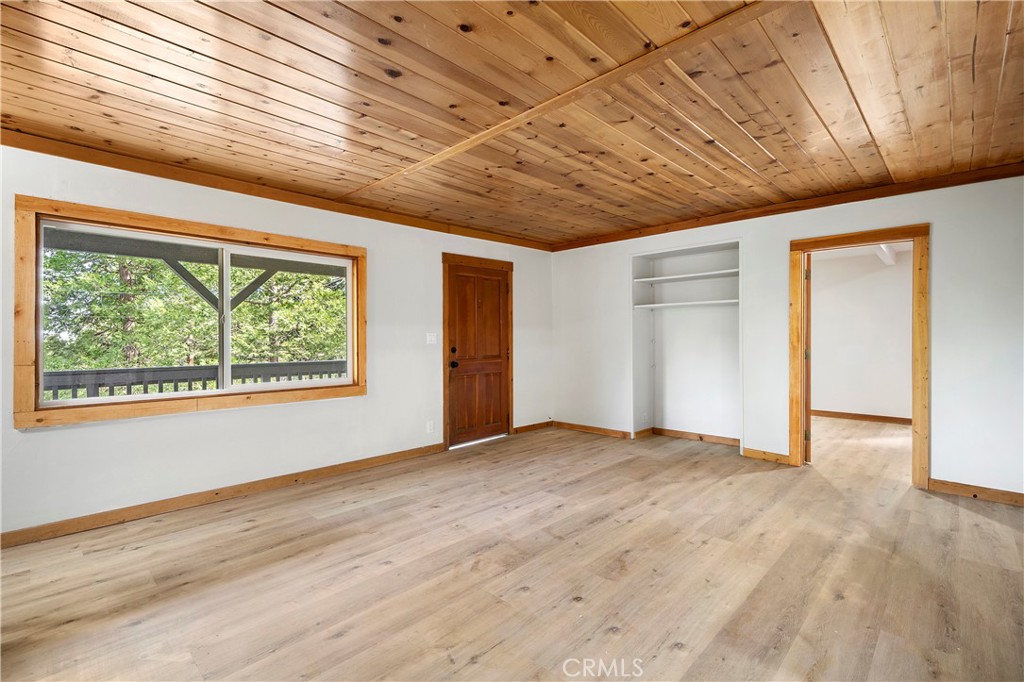 814 Glen View Lane Twin Peaks, CA 92391 - Photo 13 of 38 a view of an empty room with a window