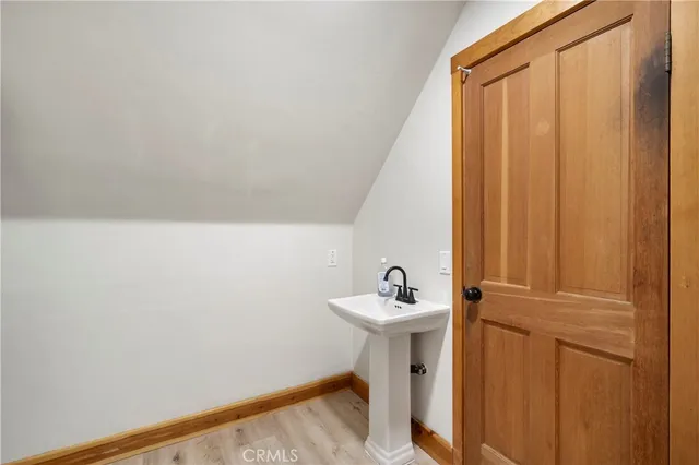 a bathroom with a sink a toilet