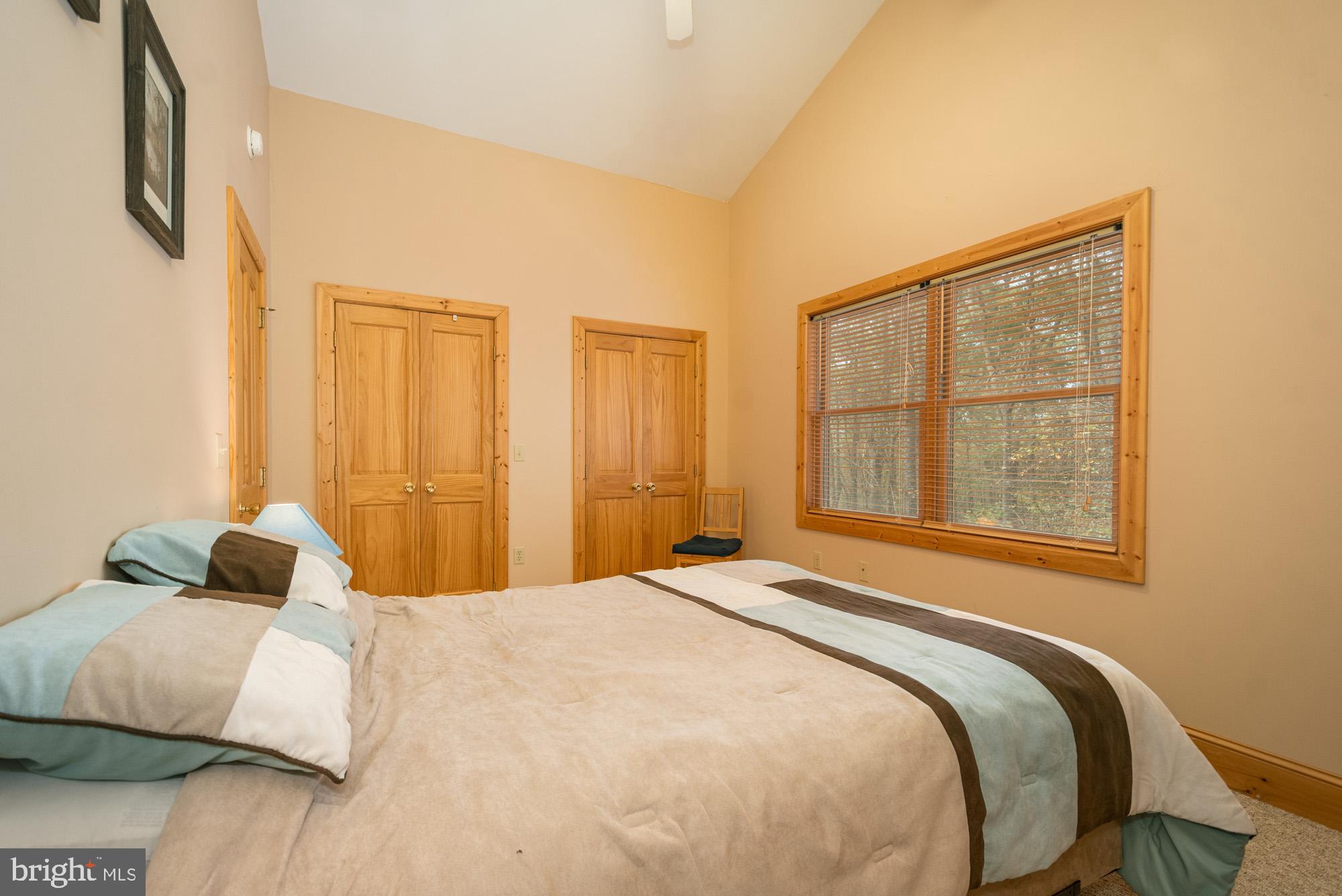 31 Linz Lane Swanton, MD 21561 - Photo 29 of 51 a bedroom with a bed and a window