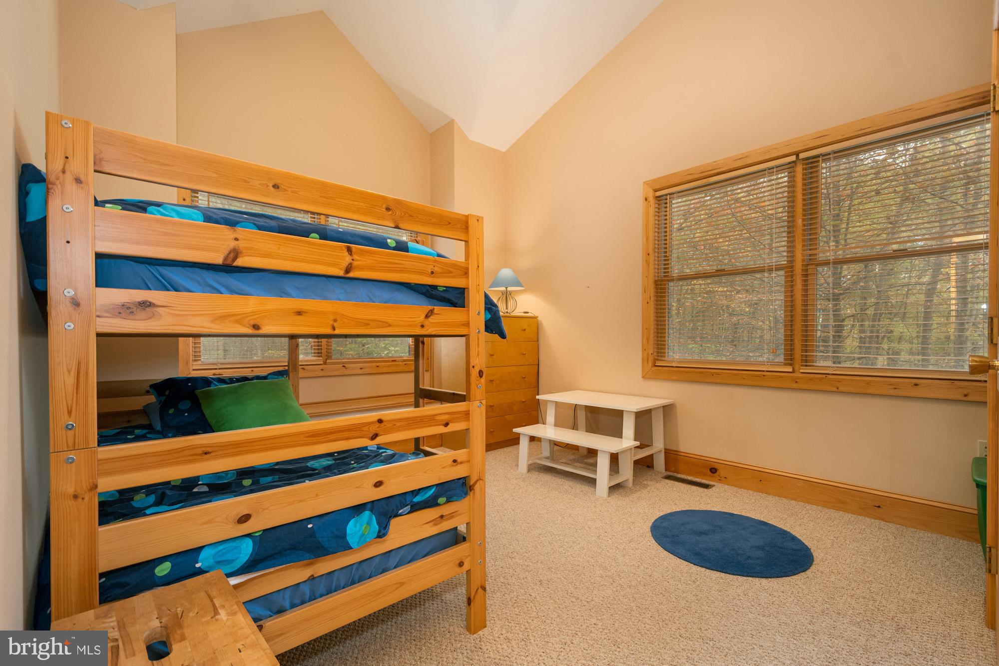 31 Linz Lane Swanton, MD 21561 - Photo 32 of 51 a backyard of a house with wooden floor and furniture