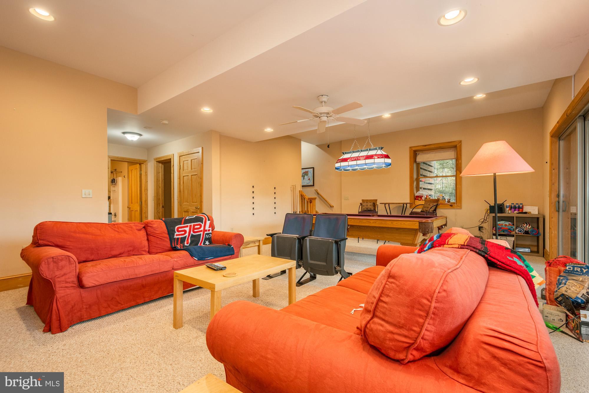 31 Linz Lane Swanton, MD 21561 - Photo 37 of 51 a living room with furniture kitchen view and a large window
