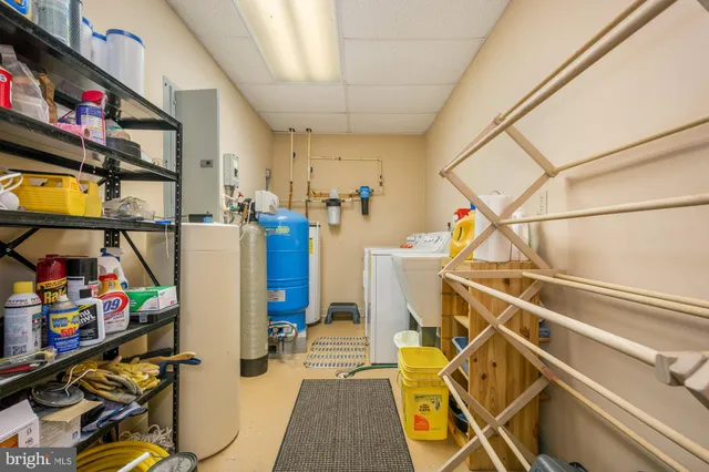 a view of outdoor space with wooden floor and windows