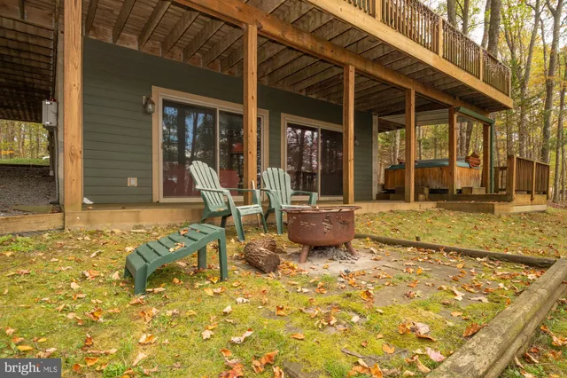 a view of a house with snow on the road