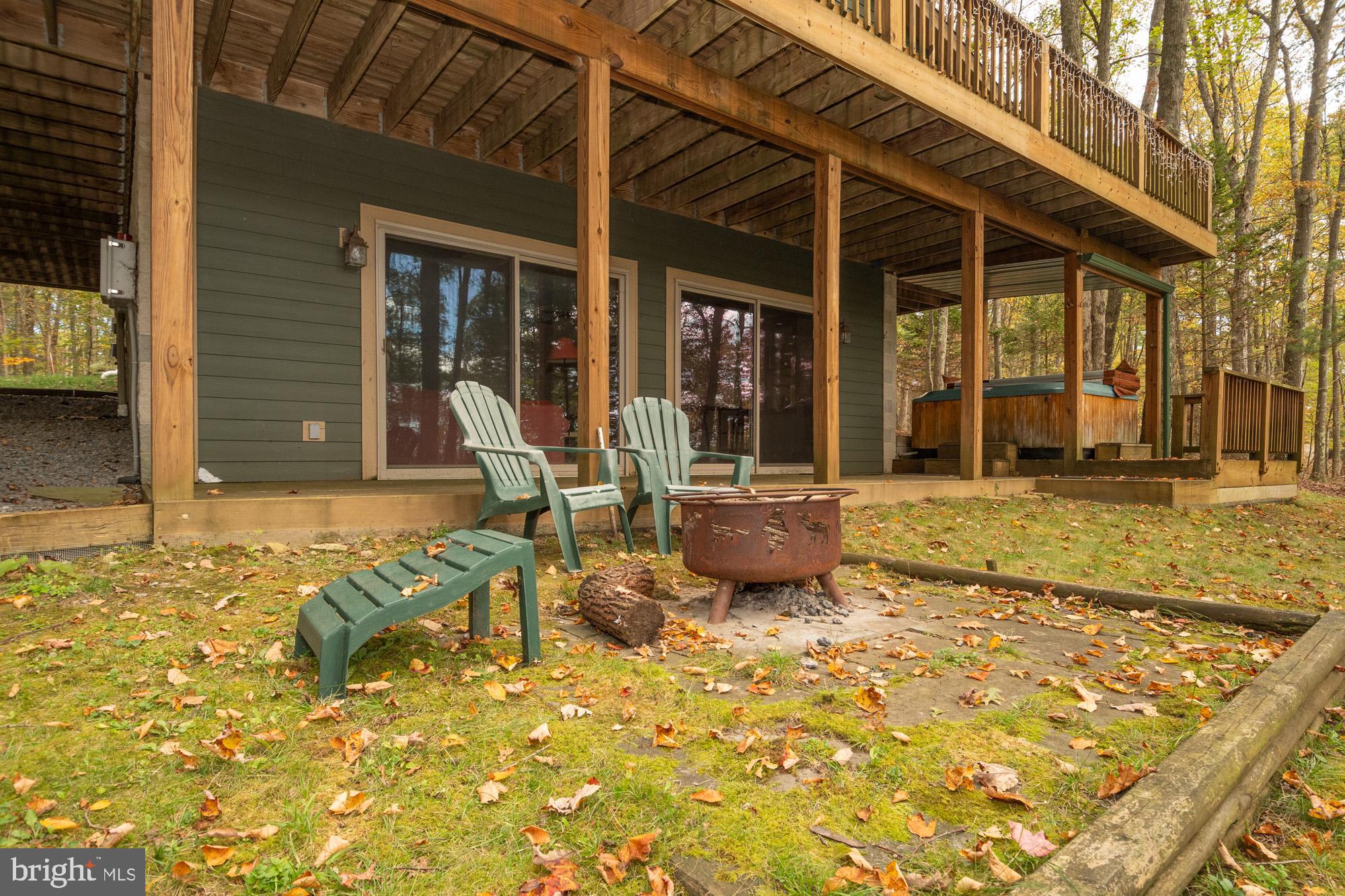 31 Linz Lane Swanton, MD 21561 - Photo 48 of 51 a view of a backyard with table and chairs