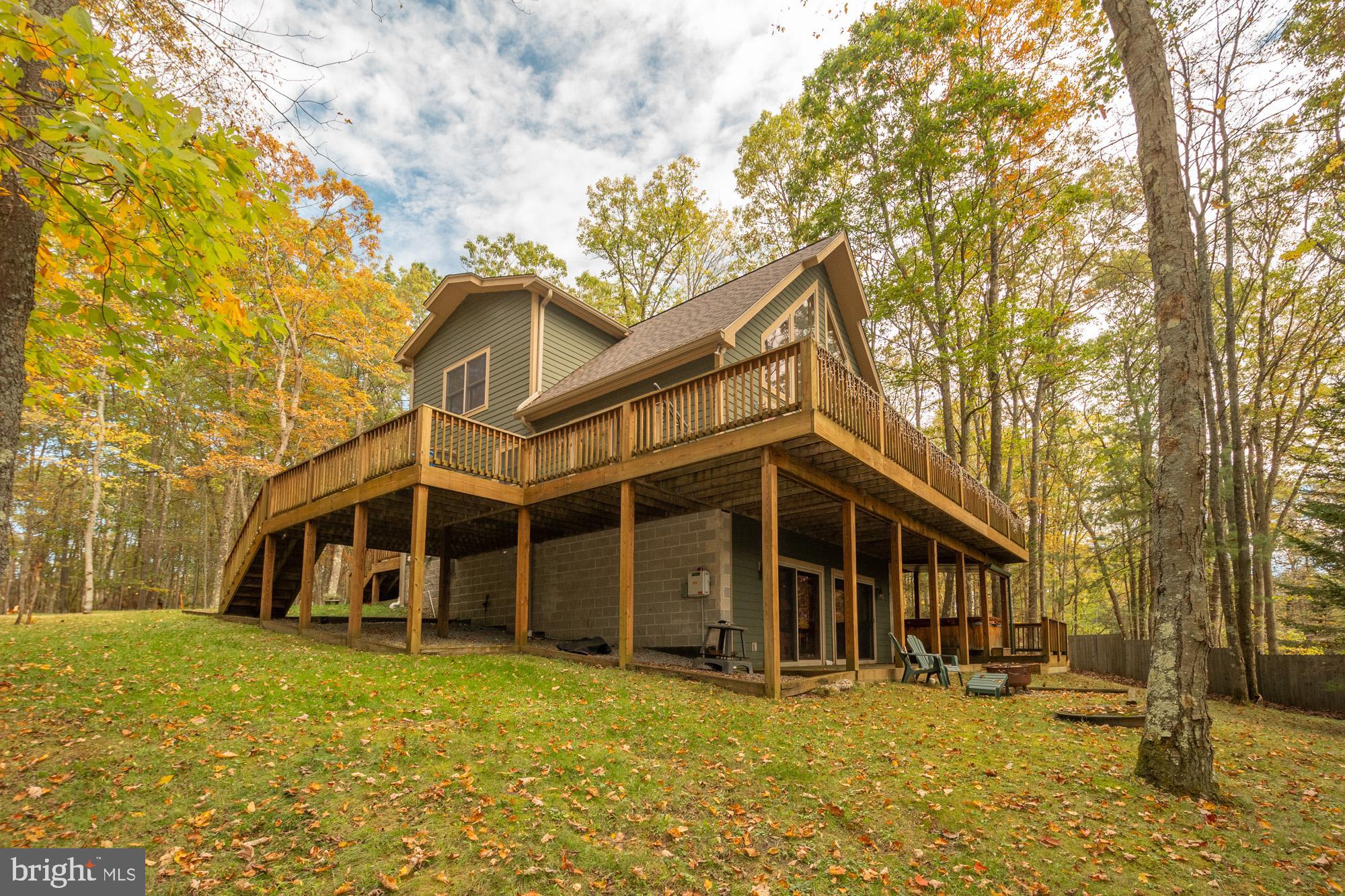 31 Linz Lane Swanton, MD 21561 - Photo 50 of 51 a view of a house with a yard and sitting area