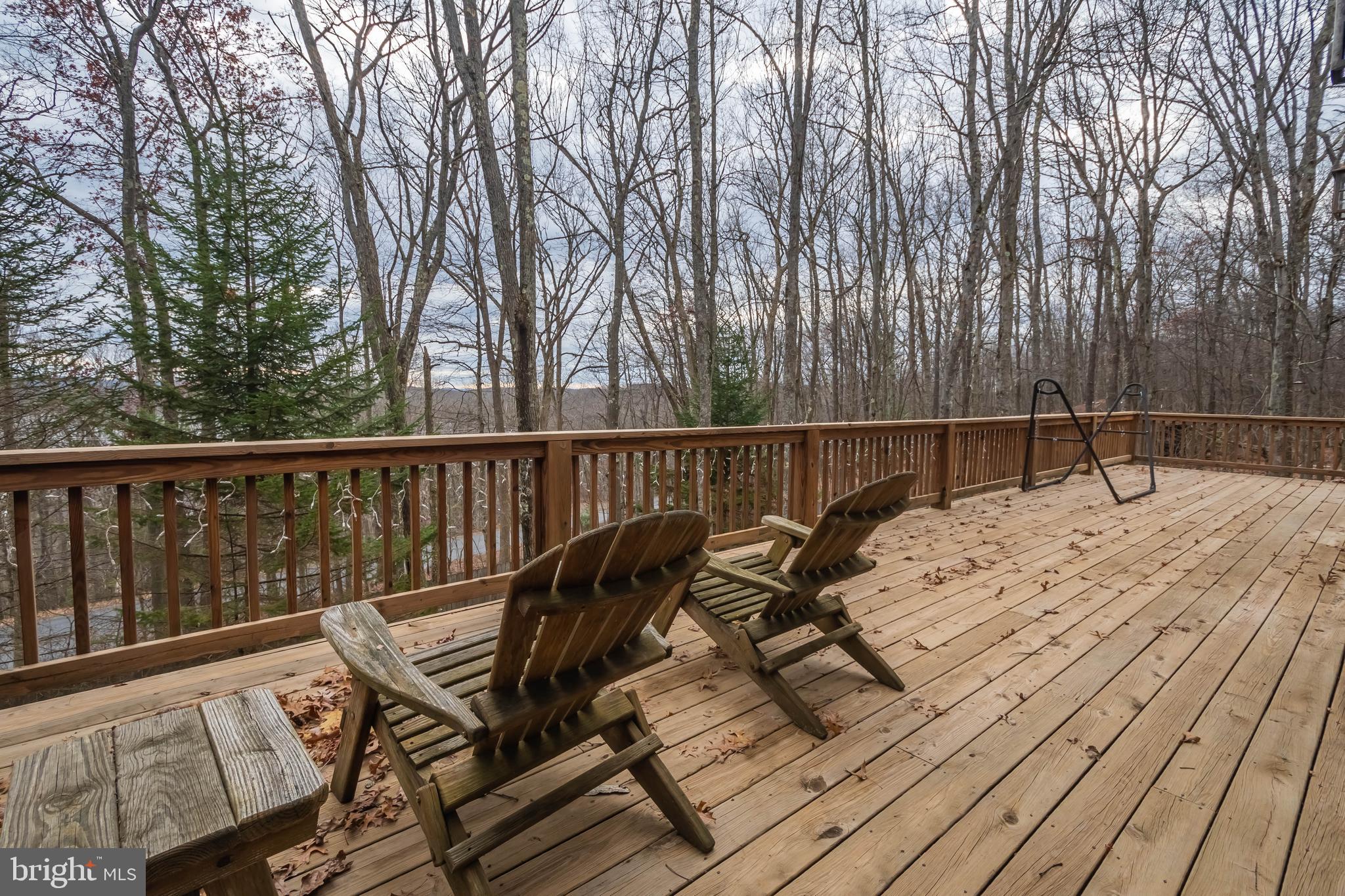 31 Linz Lane Swanton, MD 21561 - Photo 6 of 51 a view of a roof deck with wooden floor and fence