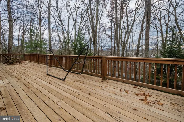 a view of balcony with wooden floor and outdoor space
