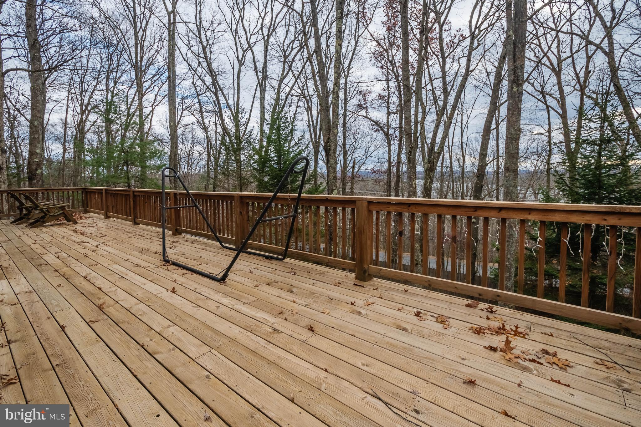 31 Linz Lane Swanton, MD 21561 - Photo 7 of 51 a view of deck with wooden floor and trees