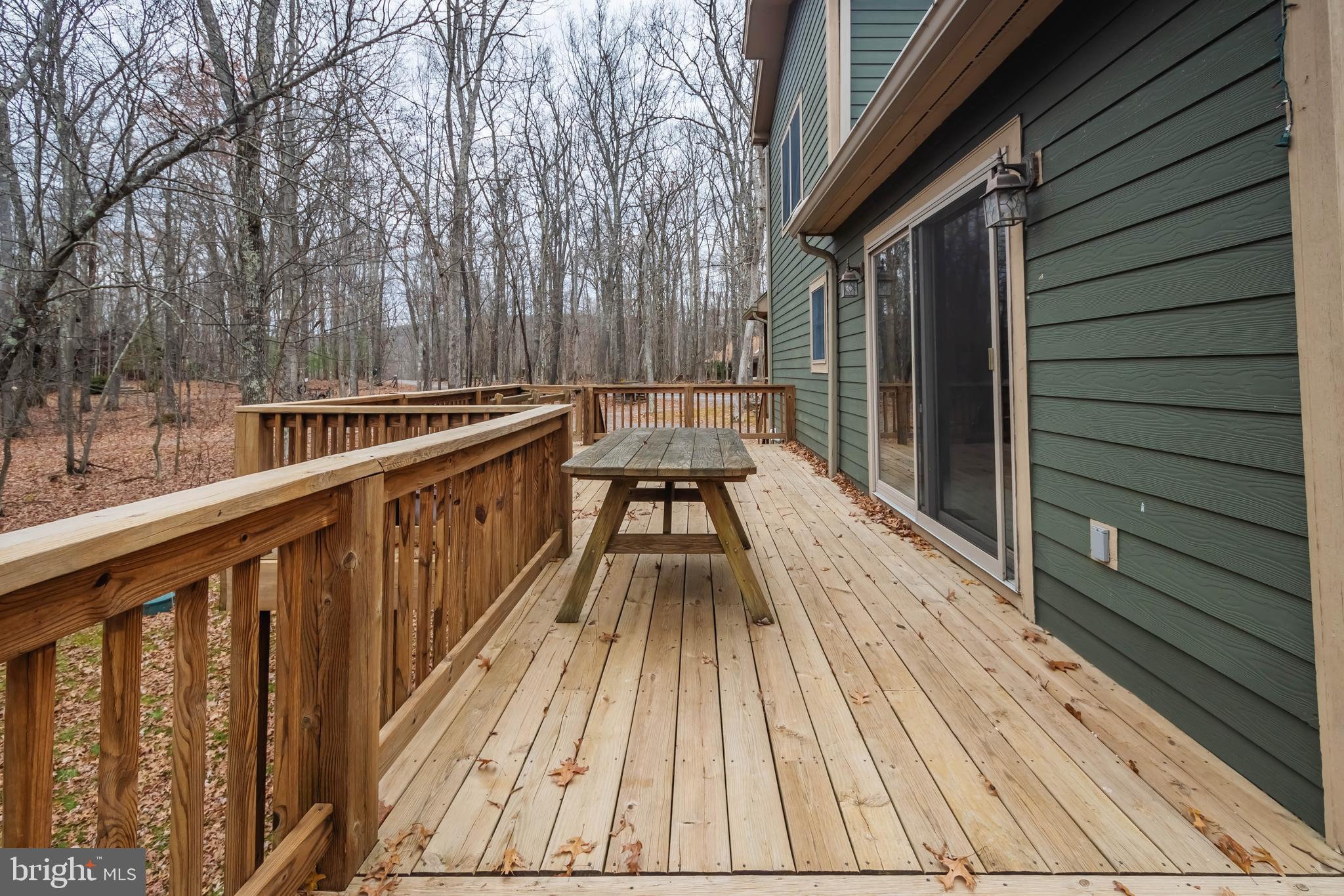 31 Linz Lane Swanton, MD 21561 - Photo 8 of 51 a view of balcony with wooden floor and outdoor space