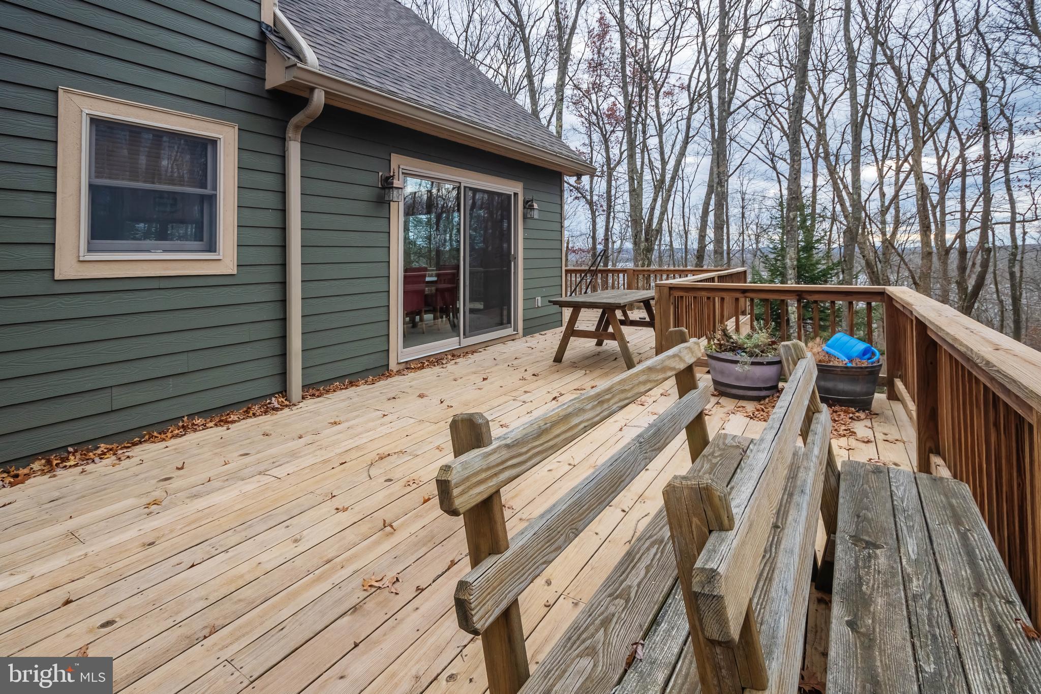 31 Linz Lane Swanton, MD 21561 - Photo 10 of 51 a view of a roof deck with wooden floor and fence
